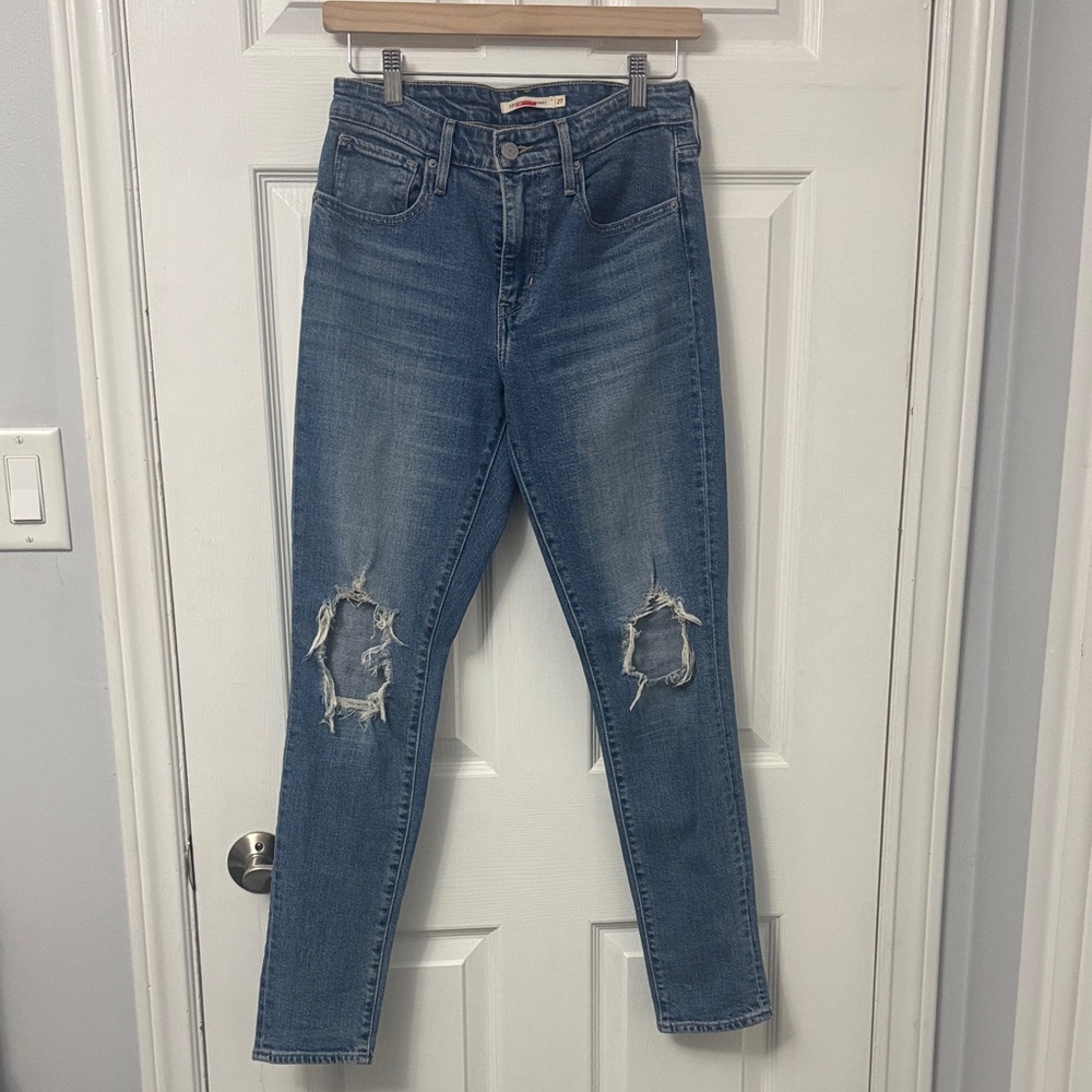 5. Levi's 721 Blue Distressed High Rise Skinny Jeans